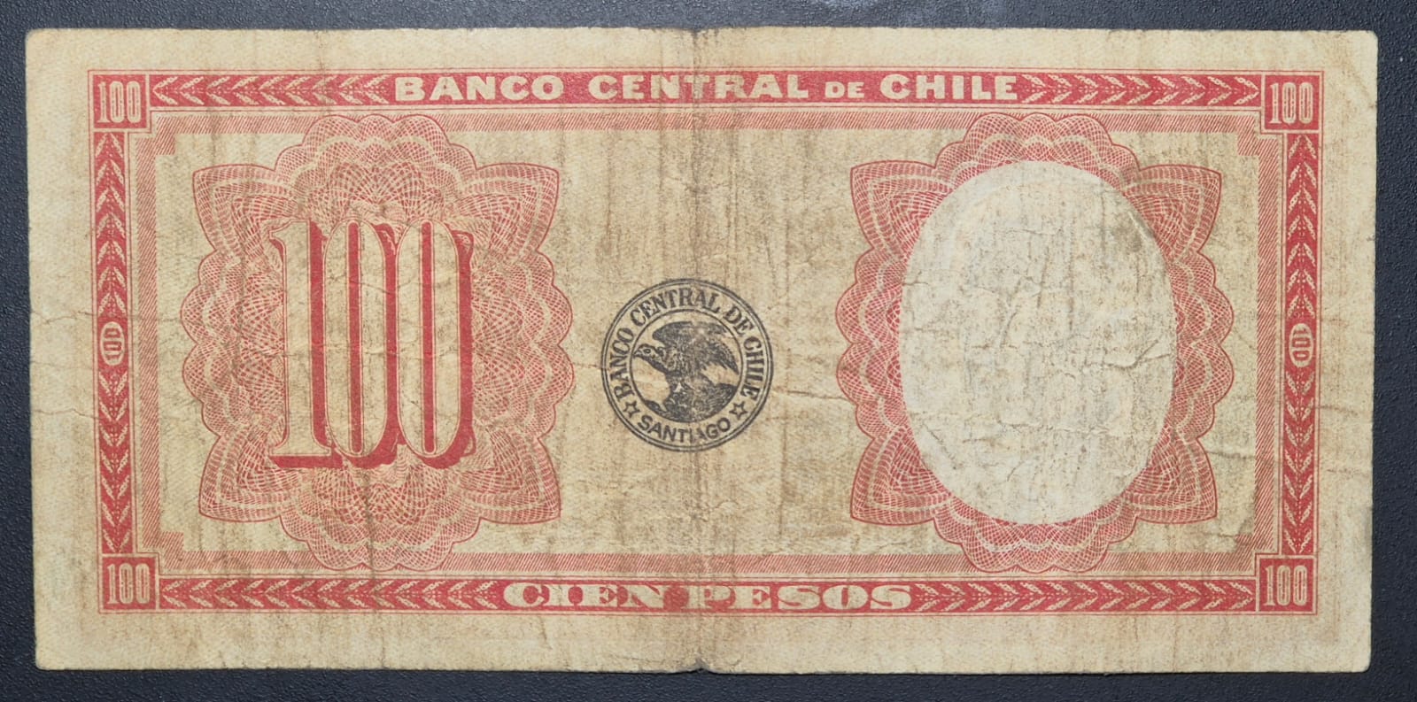 C733 .- BILLETE DE 100 PESOS DENOMINADO "CONGRIO"  PRIMERO DE LA SERIE  FECHADO: 7 DE JUNIO DE 1933  VF   CHILE